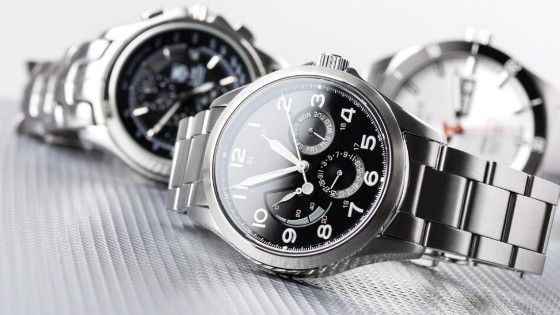 3 mechanical watches on a surface
